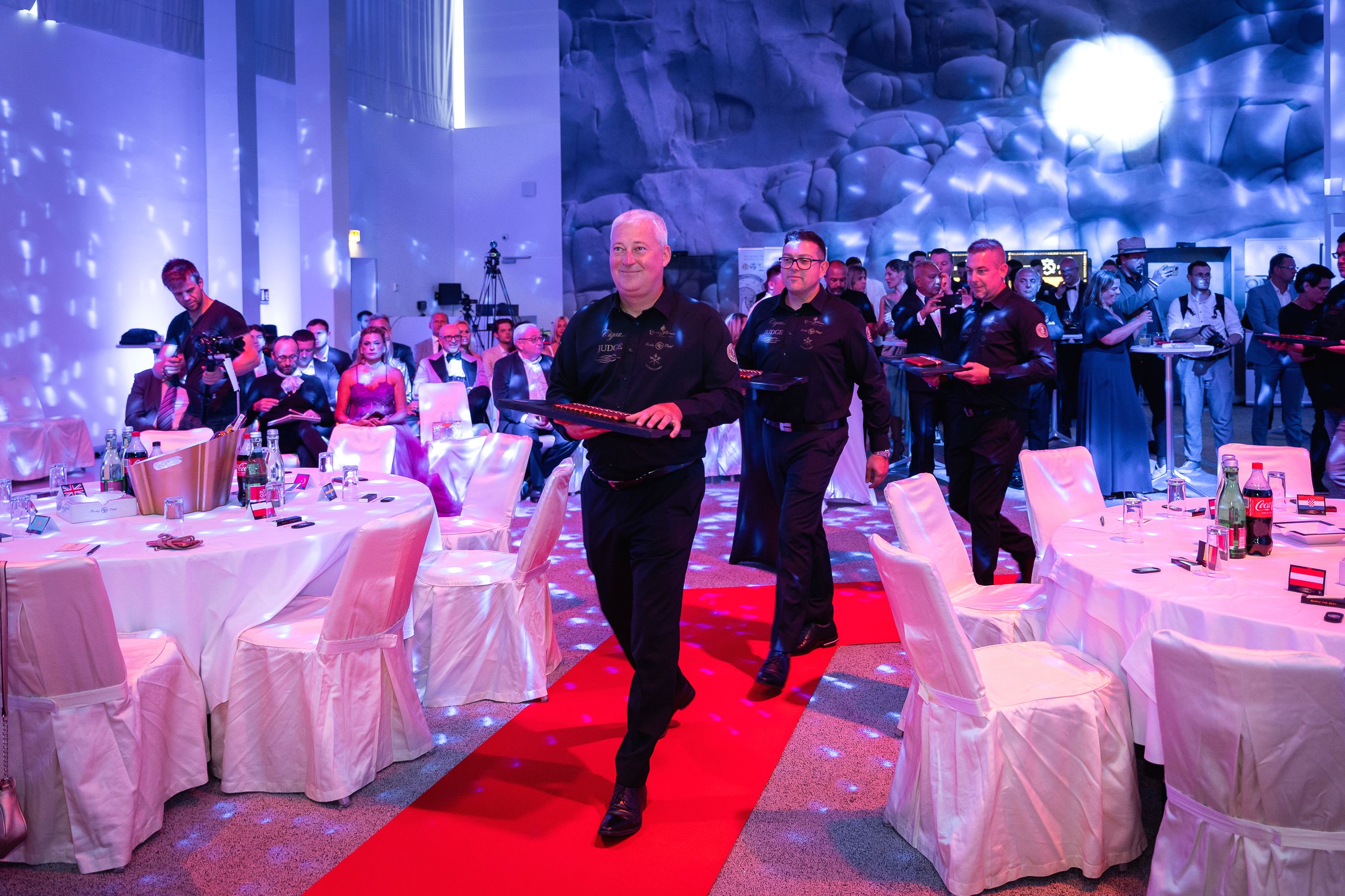 CSWC Grand Final opening ceremony - judges carry cigars down the red carpet